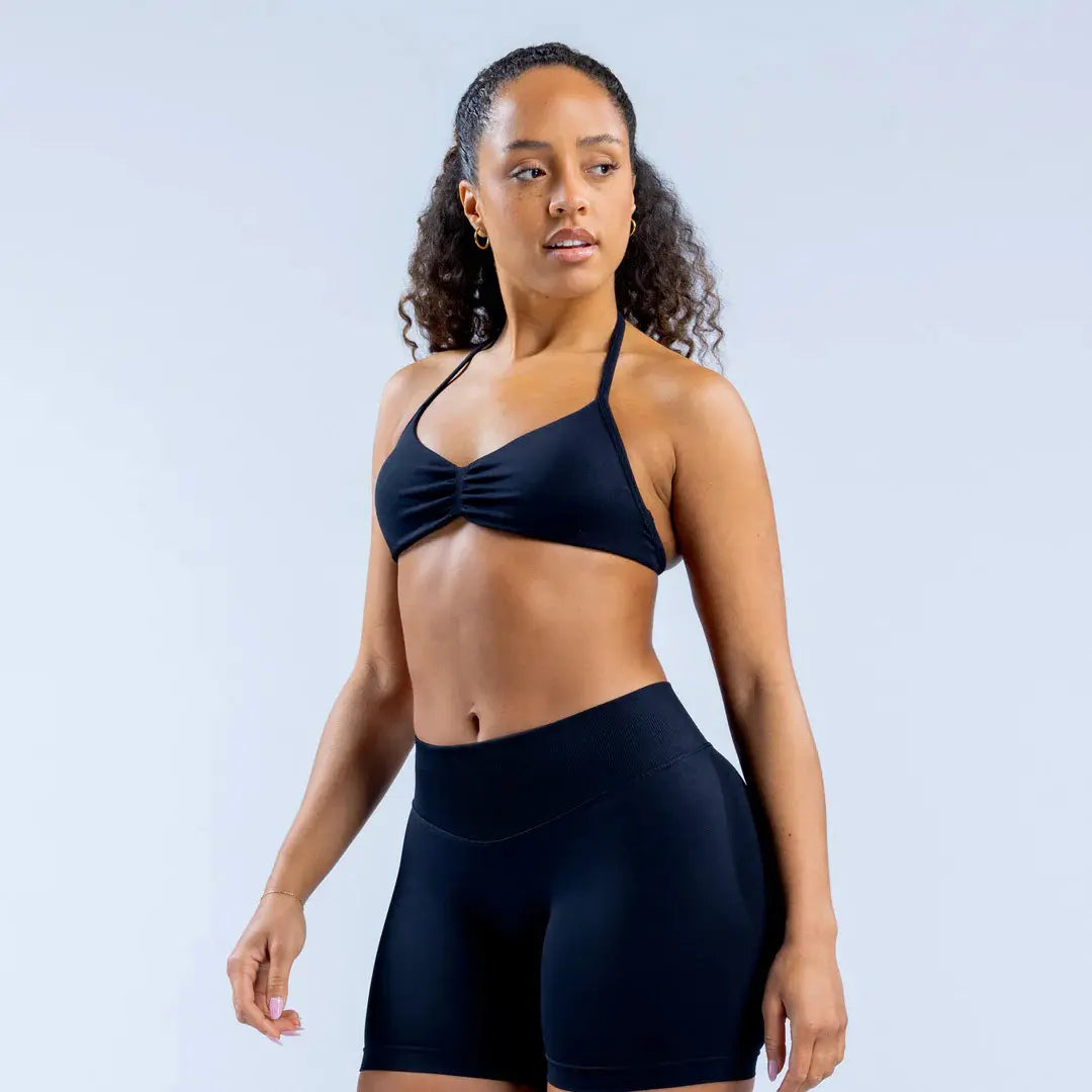 Level up your workout game with the Impact Strappy Bra! Perfect for those sweat sessions and stylish enough for everyday wear. 💪✨ #Activewear #FitnessFashion
